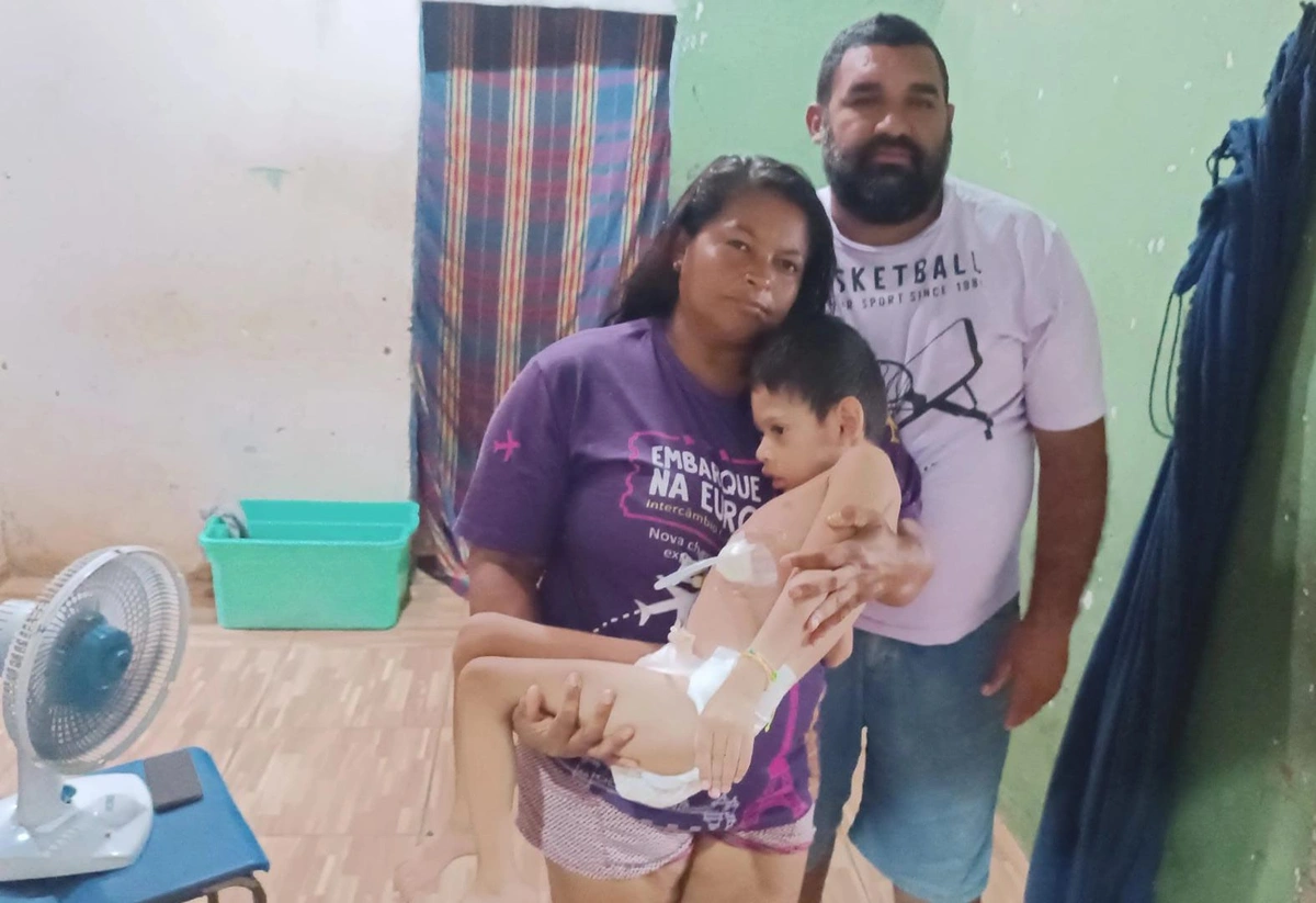 Benjamin com sua mãe dona Navegantes e o pai