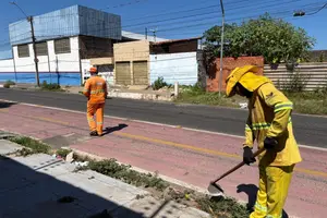 Reprodução | Ascom FMS (Foto: Ação de faxina no bairro Santa Cruz,)